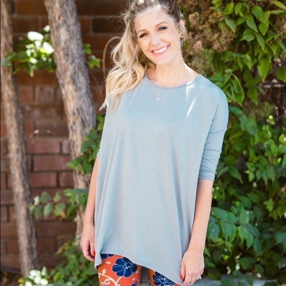 NWT LuLaRoe Irma top a loose, knit "high-low" tunic w/
fitted mid-length sleeve - Picture 4 of 4